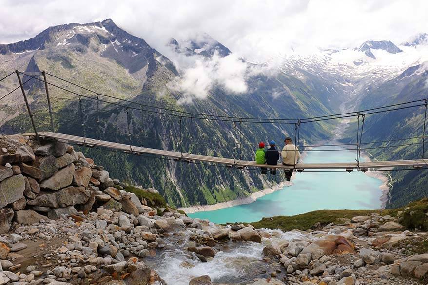 Our family sitting on the Olperer suspension bridge