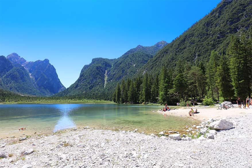 Small pebble beach at Lago di Dobbiaco in Italy