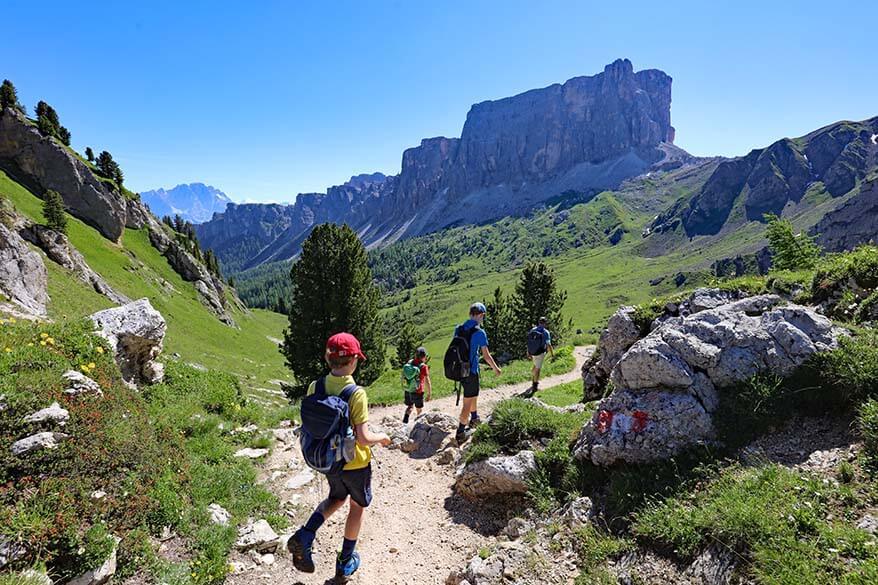 Kids hiking on the trail 436 Passo Giau