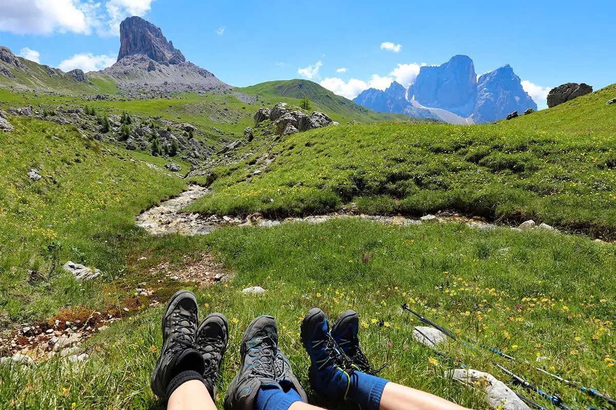 Hiking shoes with Dolomites mountains background