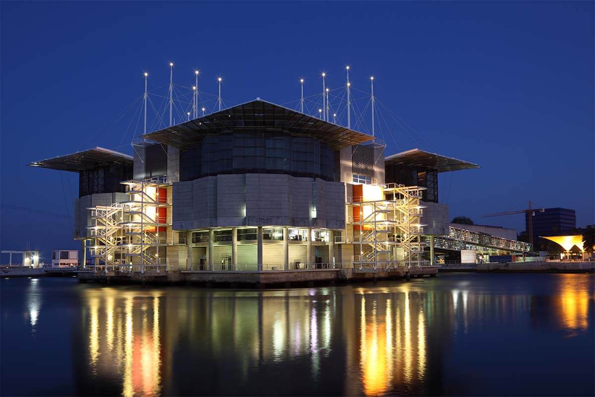 Lisbon Oceanarium building lit at night