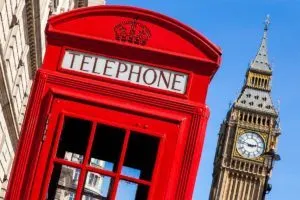 Big Ben tower and red telephone box in London