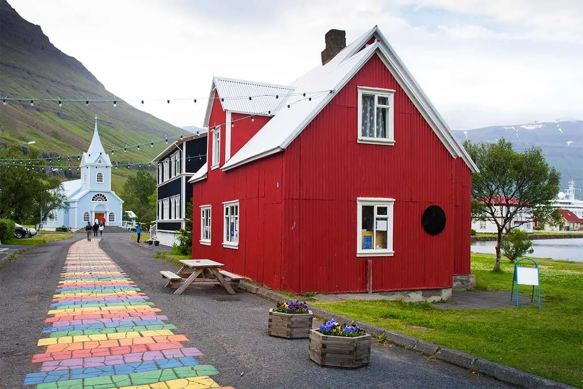 Seydisfjordur rainbow path and church in eastern Iceland