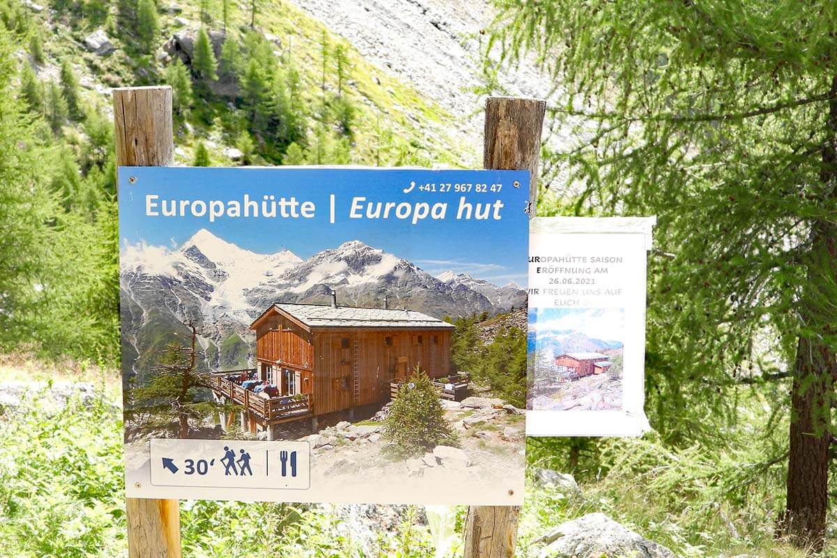 Europa Hut info sign and picture at Charles Kuonen Suspension Bridge