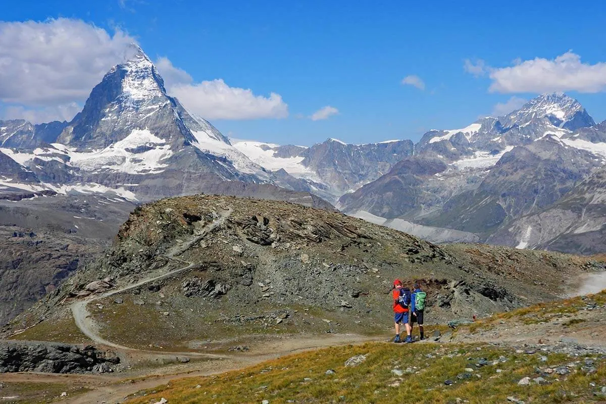 Kids hiking from Gornergrat to Riffelsee with view of the Matterhorn in Zermatt