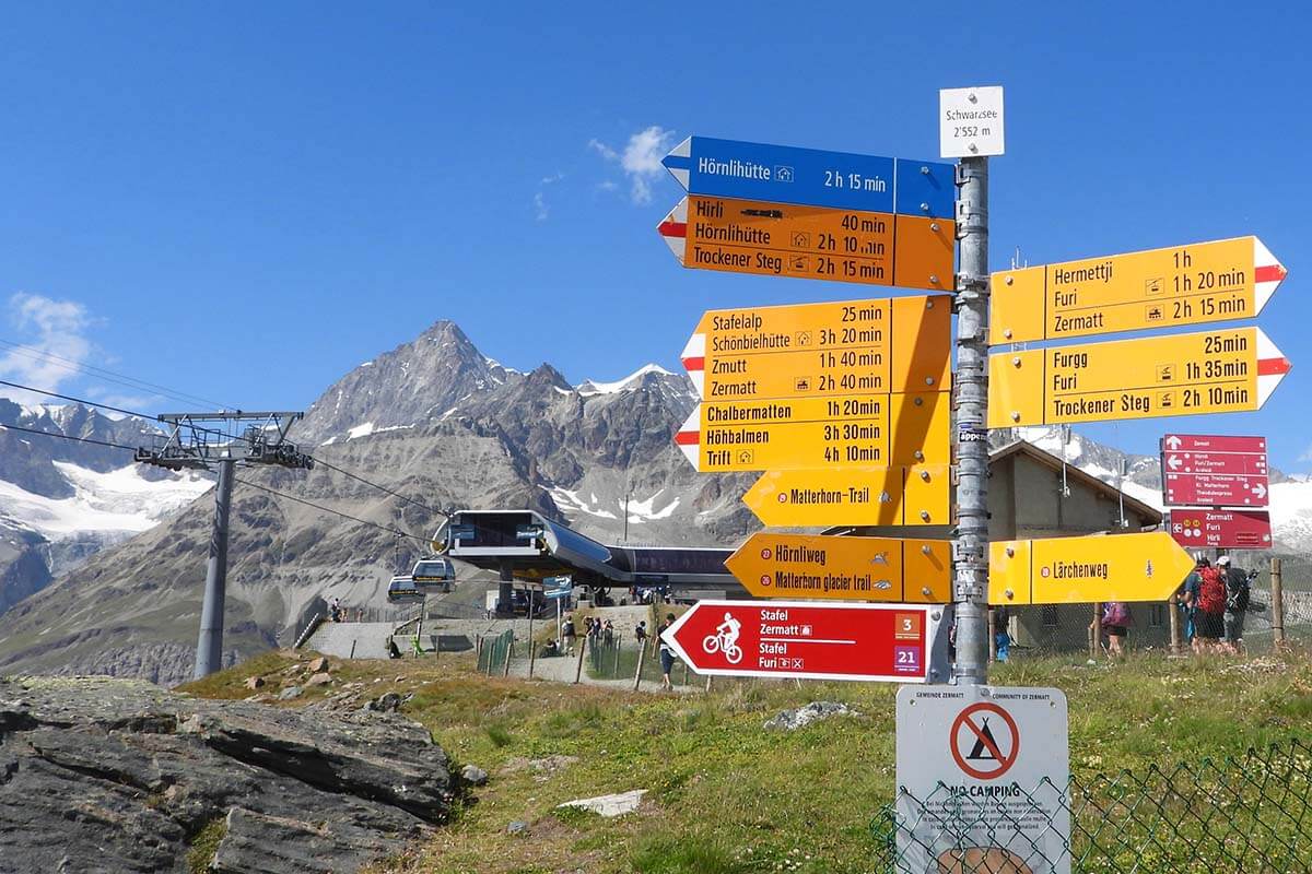 Hiking signs at Schwarzsee gondola station in Zermatt