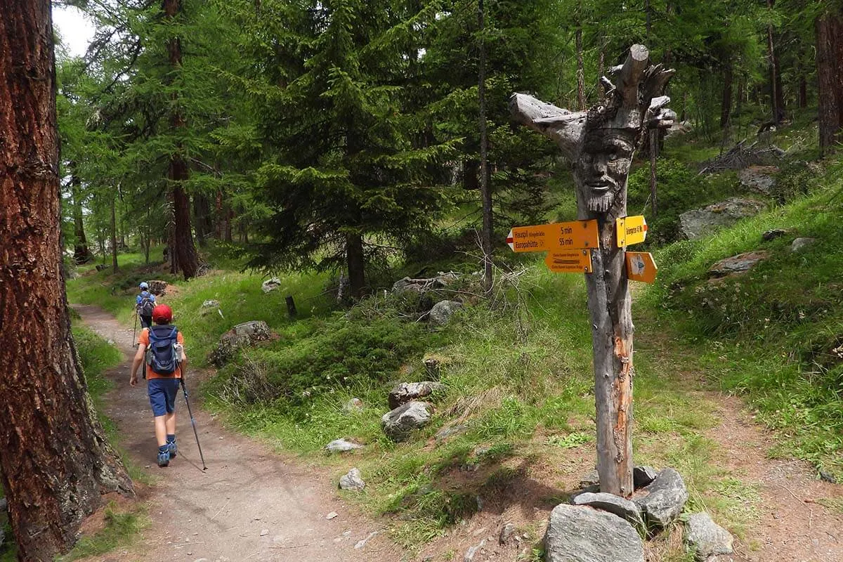 Kids hiking to Charles Kuonen Suspension Bridge in Randa Switzerland