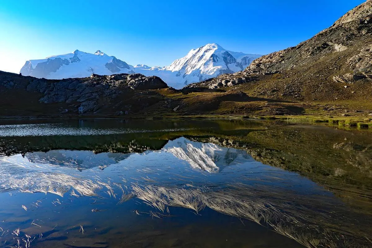 Mountain reflections on Riffelsee lake in Zermatt