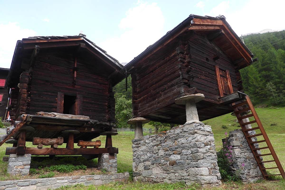 Traditional dark wooden houses on stilts in the Valais region in Switzerland