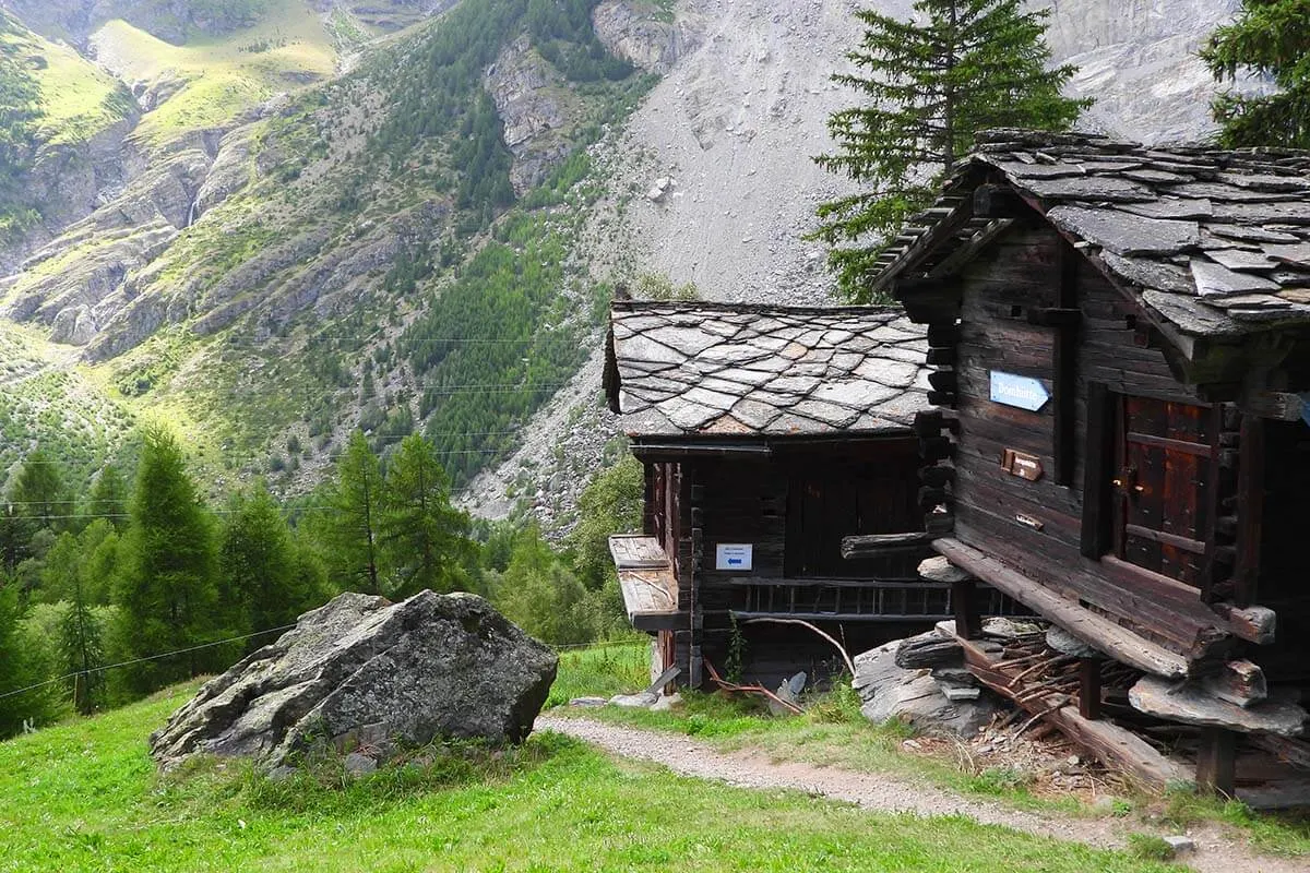 Wooden mountain chalets along the Randa suspension bridge hike nr 69 near Zermatt