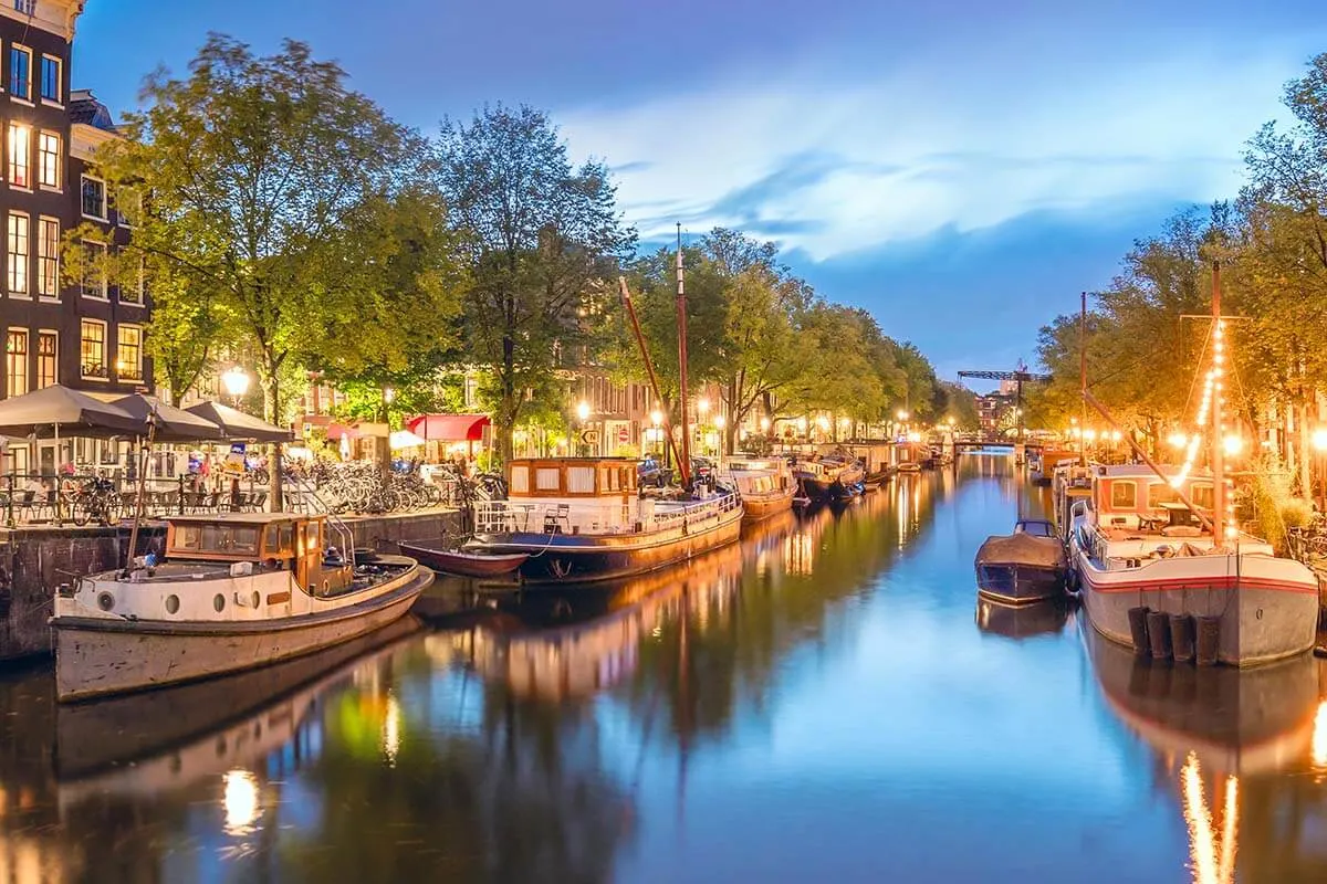 Amsterdam canals lit at night