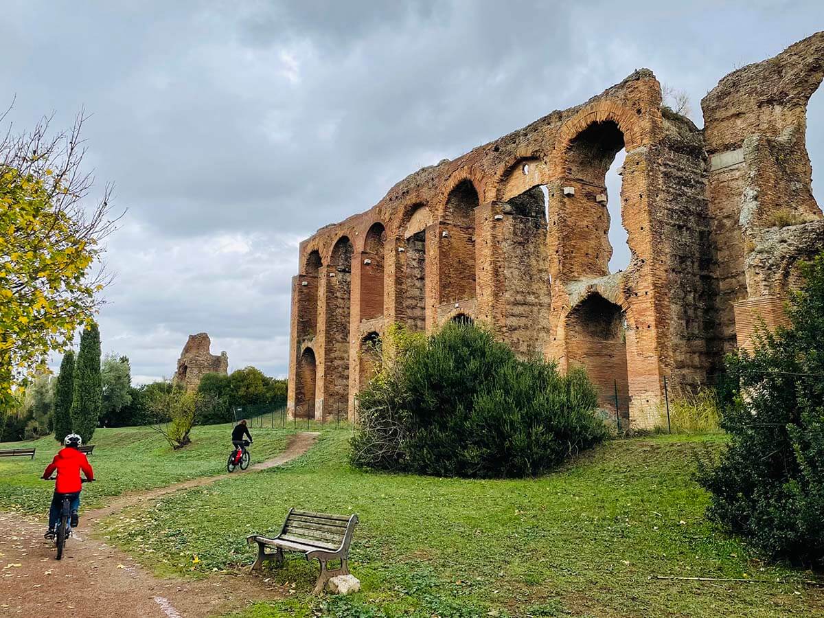 Biking near the Roman aqueducts in Rome Italy