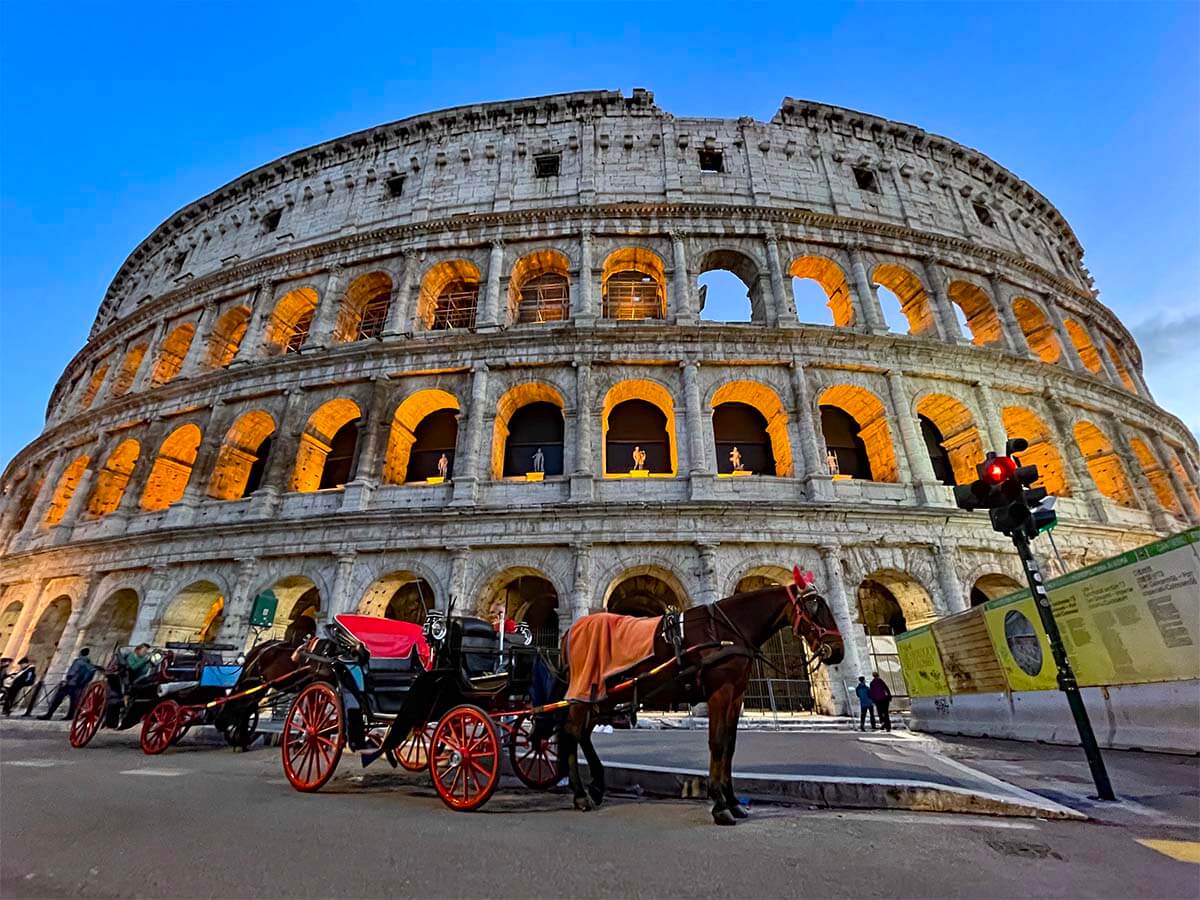 Colosseum and horse-drawn carriages