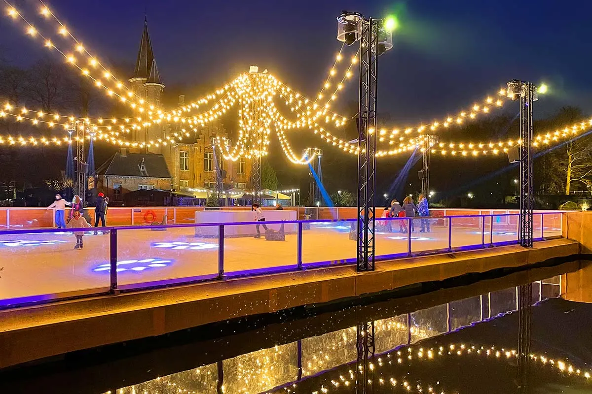 Bruges in winter - ice skating rink during the annual Christmas market