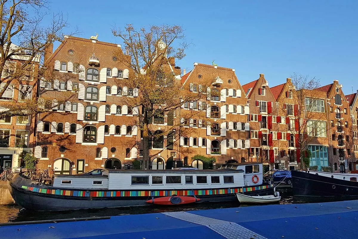 Canals and colorful houses of Jordaan neighborhood in Amsterdam