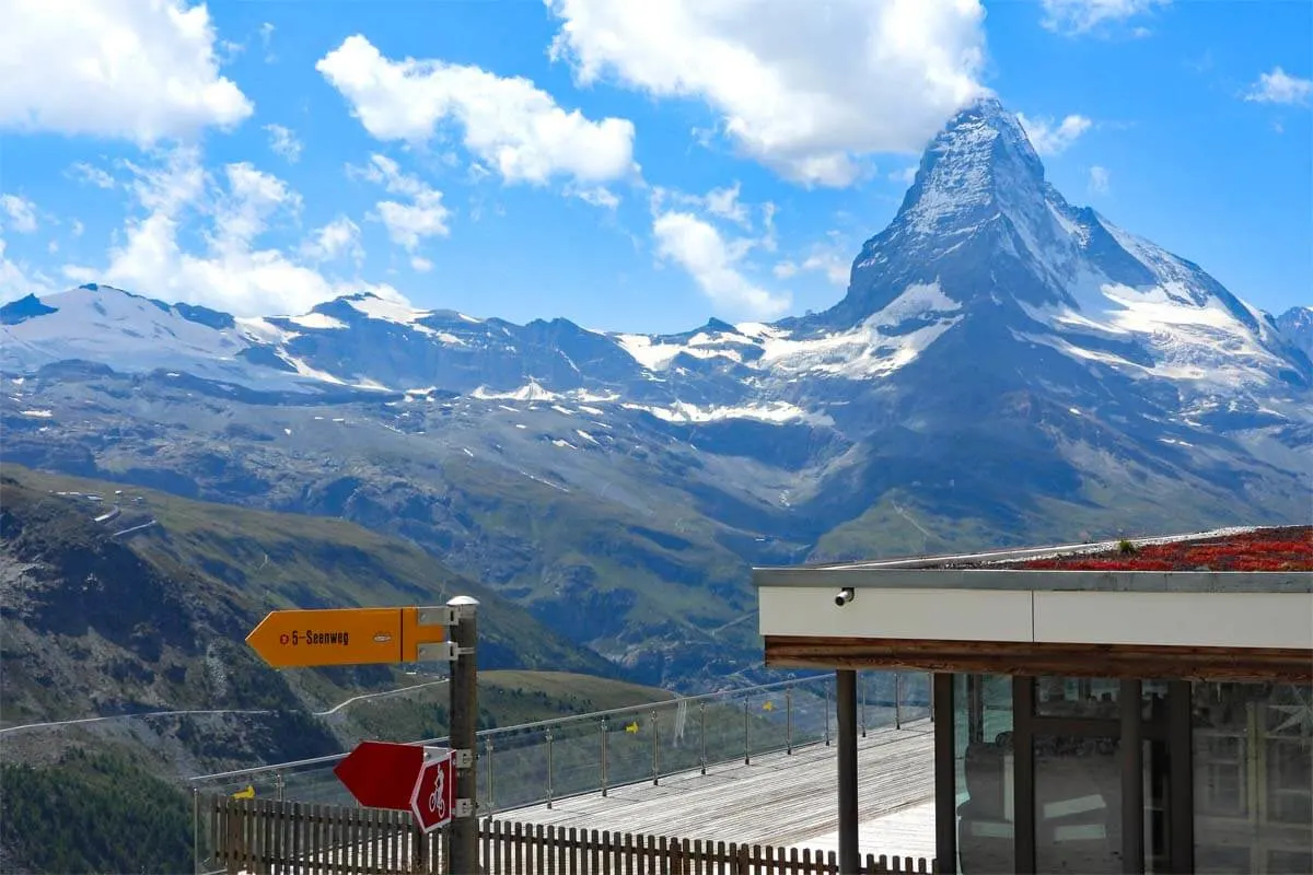 5 Seenweg hiking sign and the Matterhorn as seen at Blauherd gondola station in Zermatt
