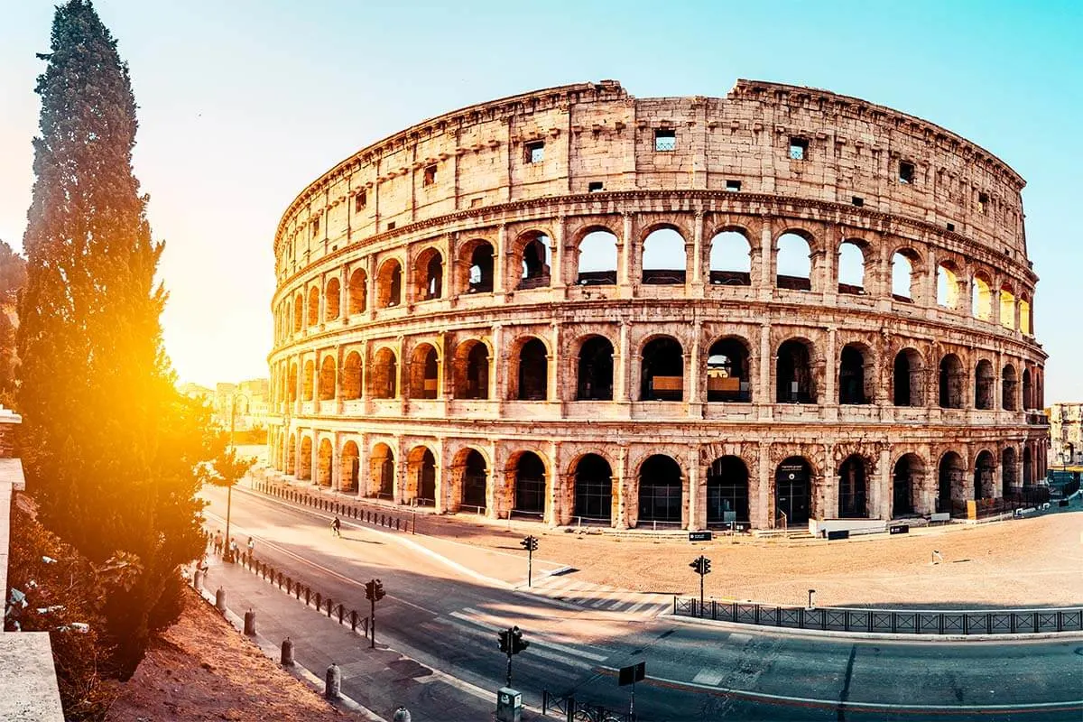 View of the Colosseum at sunrise from Via Nicola Salvi in Rome