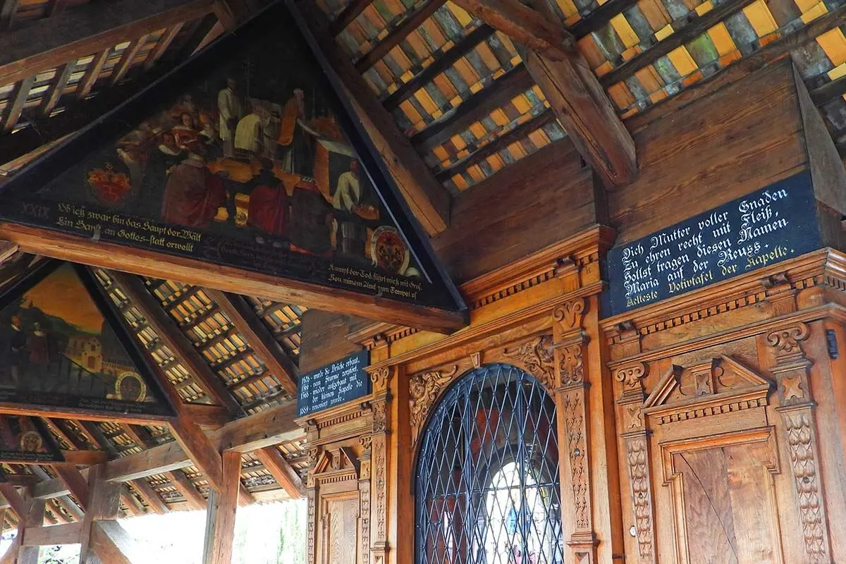 Wooden carvings and paintings on the inside of the Spreuer Bridge in Lucerne