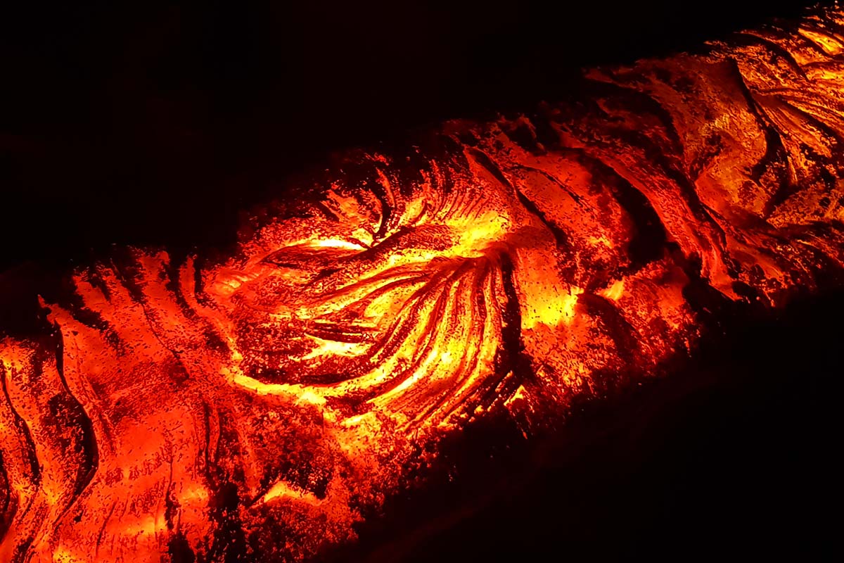 Red lava flow at São Vicente Caves and Volcanism Center in Madeira