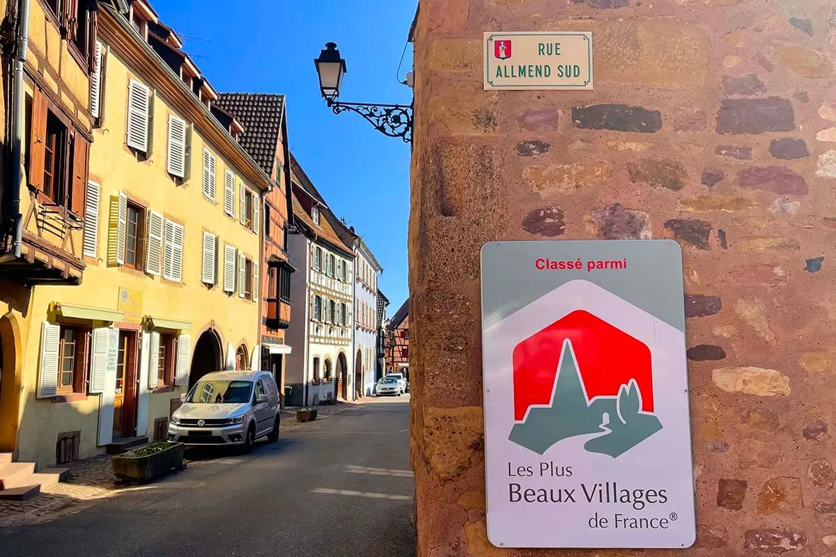 Les Plus Beaux Villages de France sign at the old town gates in Eguisheim
