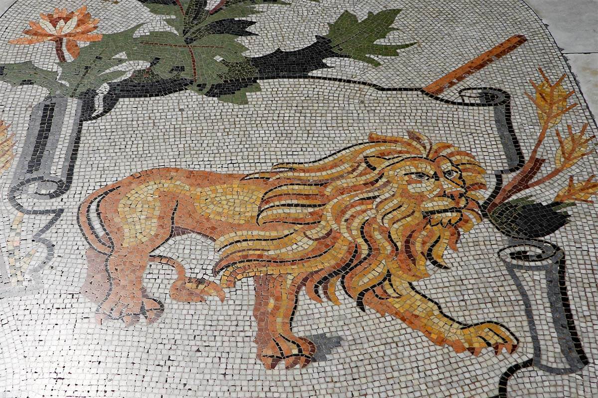 Lion mosaic at Galleria Umberto I in Naples