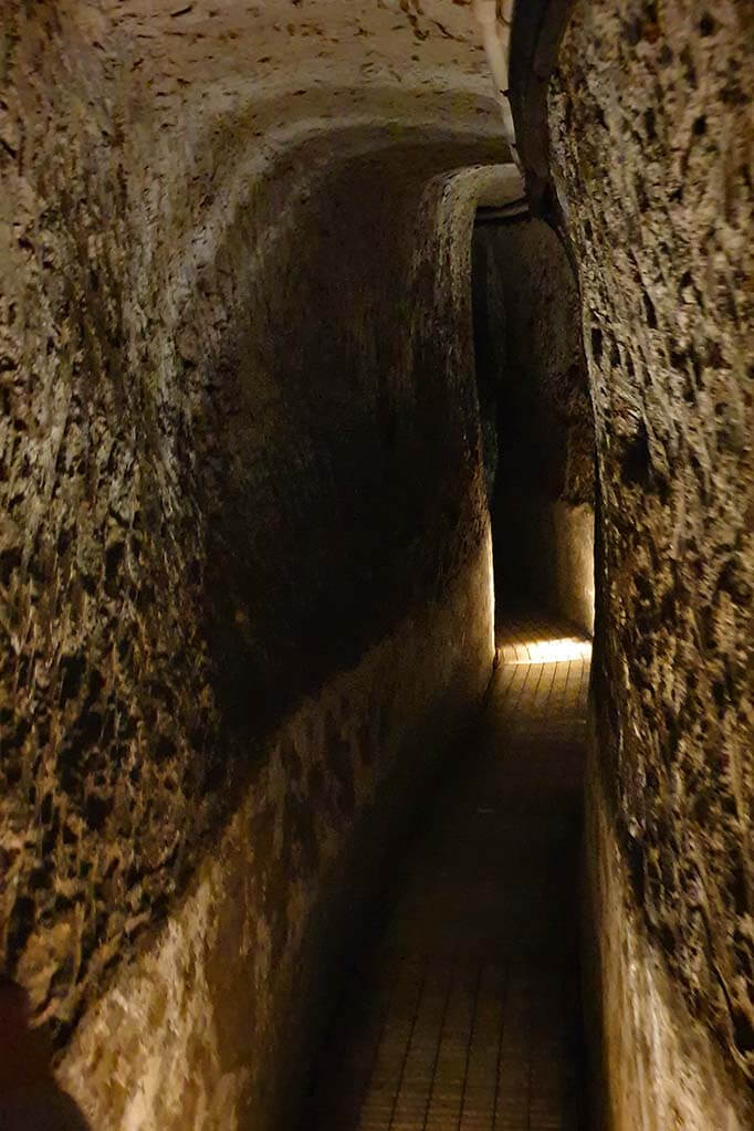 Narrow tunnels of Napoli Sotterranea underground site in Naples Italy