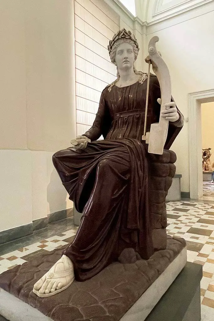 Sculpture of Apollo seated with lyre at Naples National Archaeological Museum