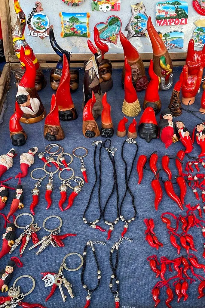 Traditional Napoli souvenirs corno and Pulcinella for sale in Naples