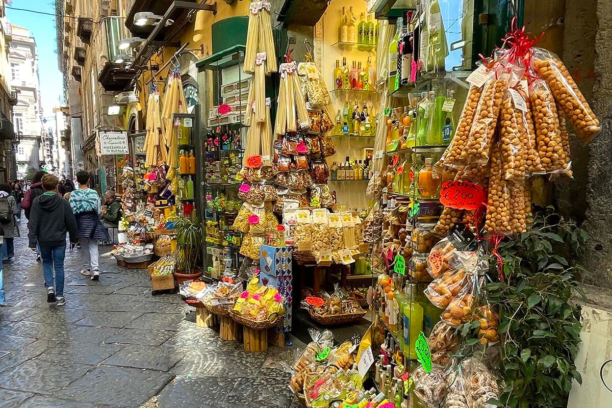 Colorful shops on Spaccanapoli street in Naples