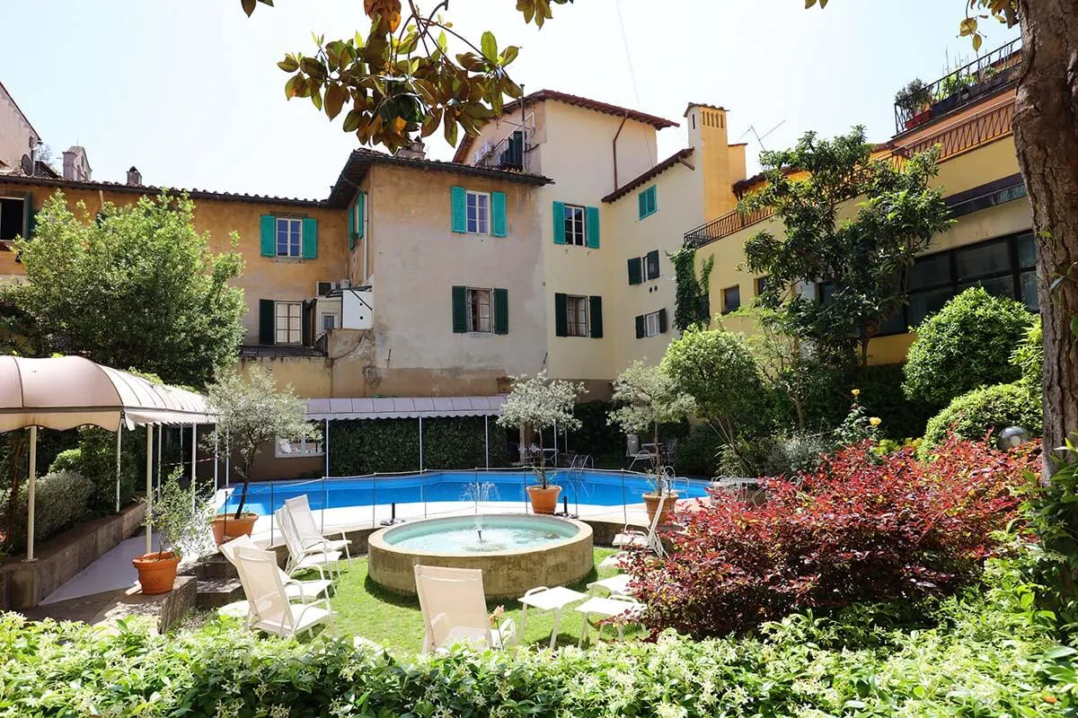 Pool and garden of Hotel Croce di Malta in Florence Italy