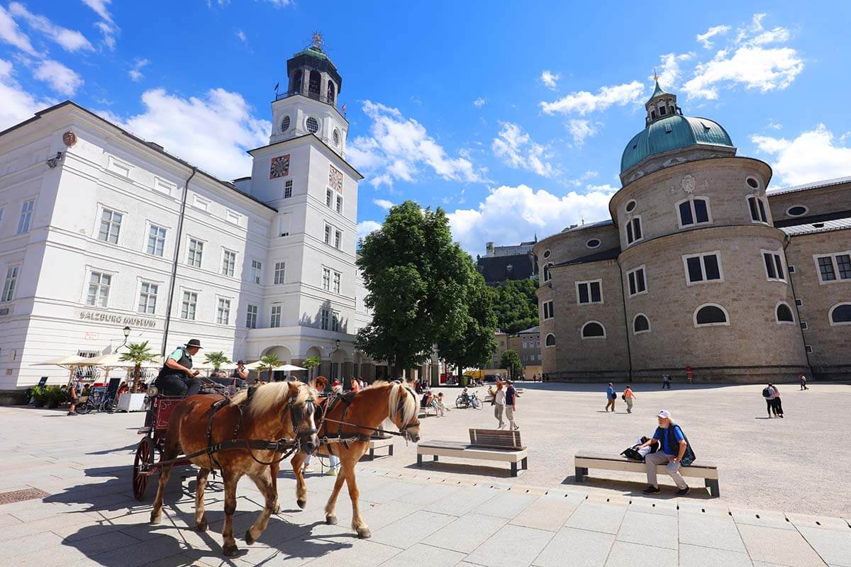 Horse and carriage on Residenzplatz in Salzburg Austria