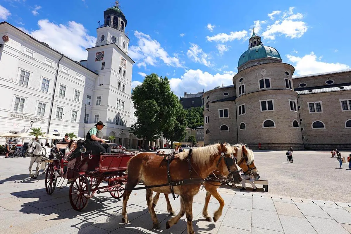Horse-drawn carriage on Residenzplatz in Salzburg old town