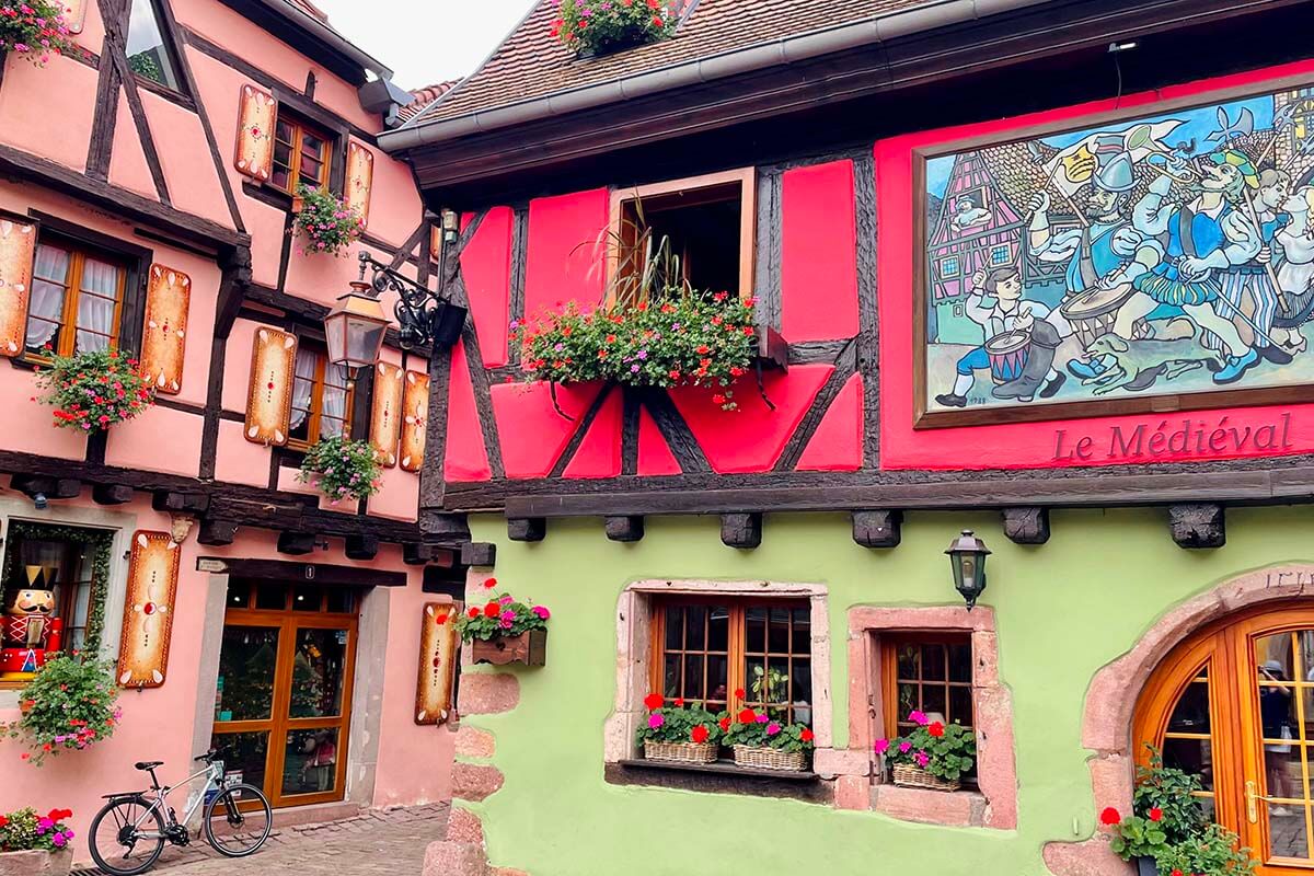 Colorful half-timbered houses in Riquewihr village in Alsace France