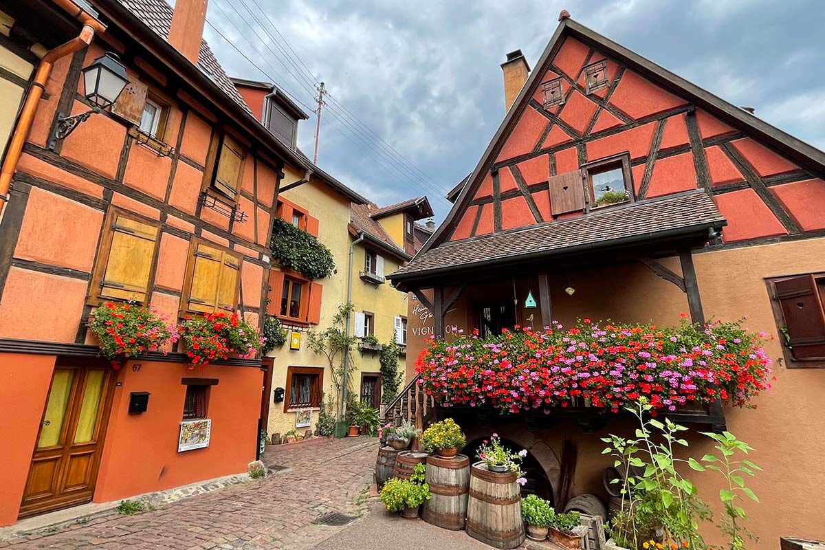 Colorful traditional houses in Eguisheim town in Alsace France
