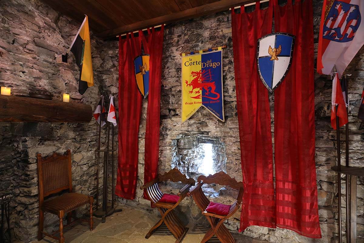 Knight flags inside Vezio Castle in Varenna, Italy