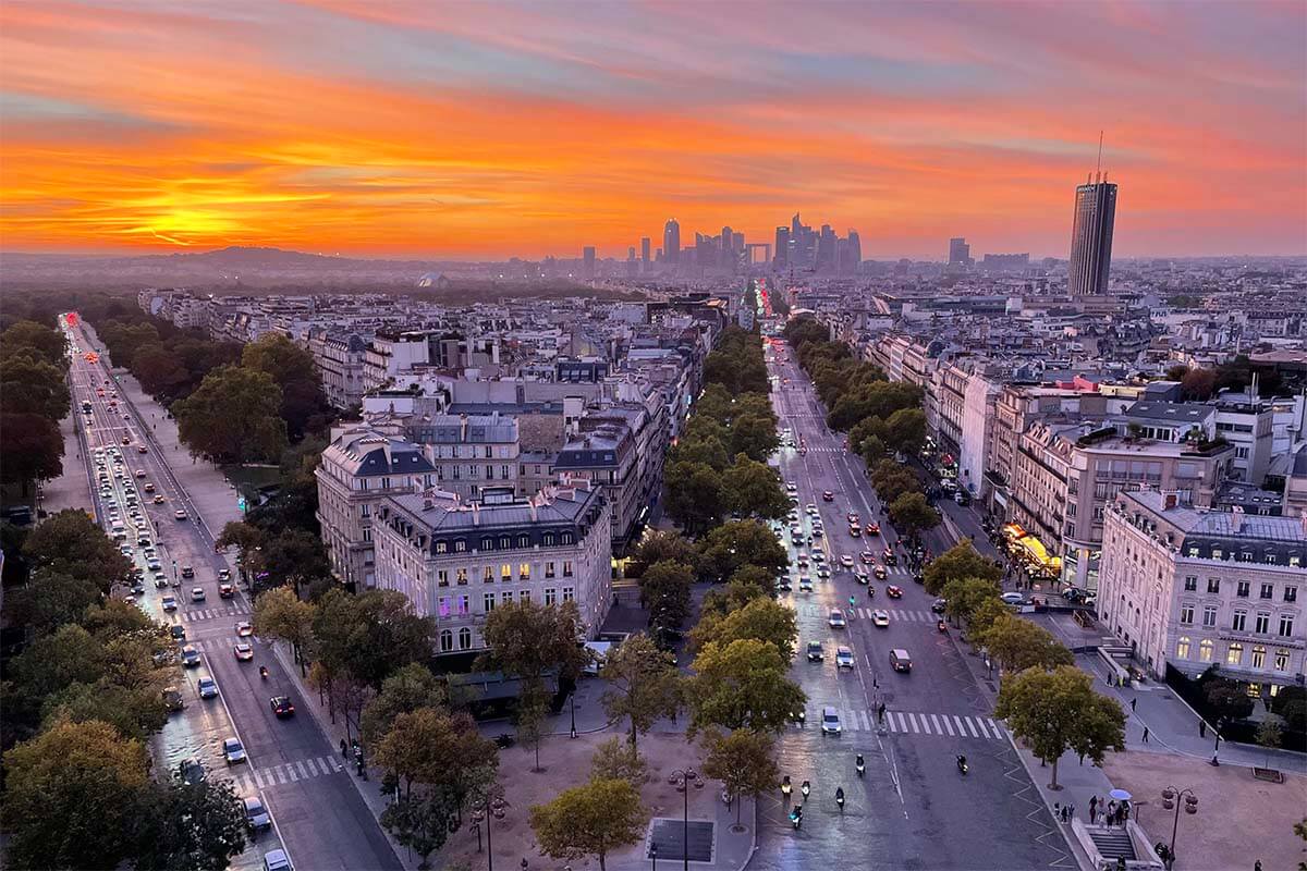 Paris sunset view from Arc de Triomphe rooftop terrace