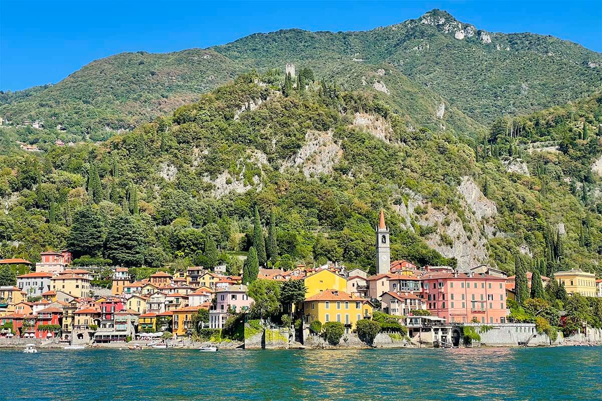 Varenna town and Vezio Castle as seen from a boat in Lake Como