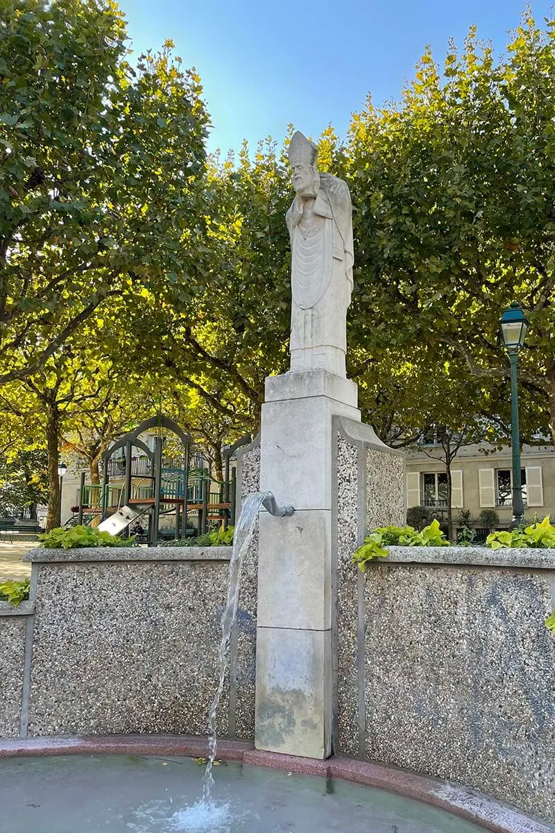 Headless statue of Saint Denis in Montmartre, Paris