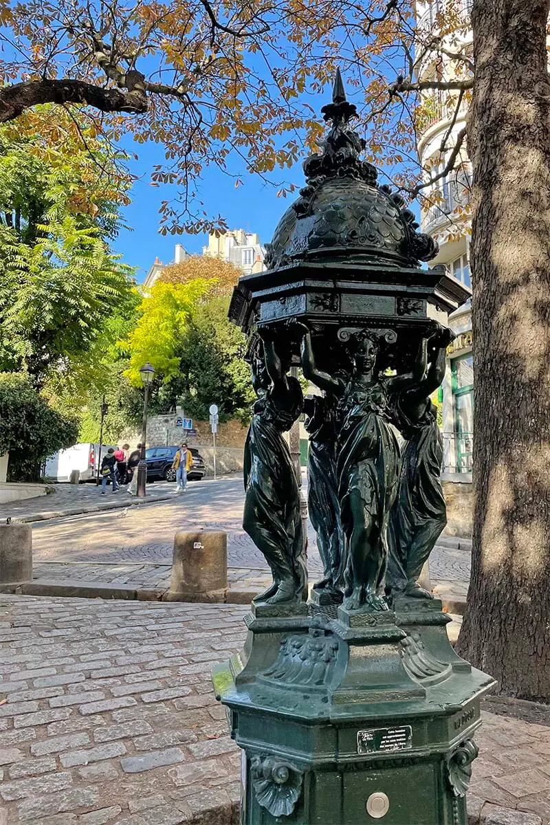 Parisian Wallace fountain on Place Emile Goudeau in Montmartre