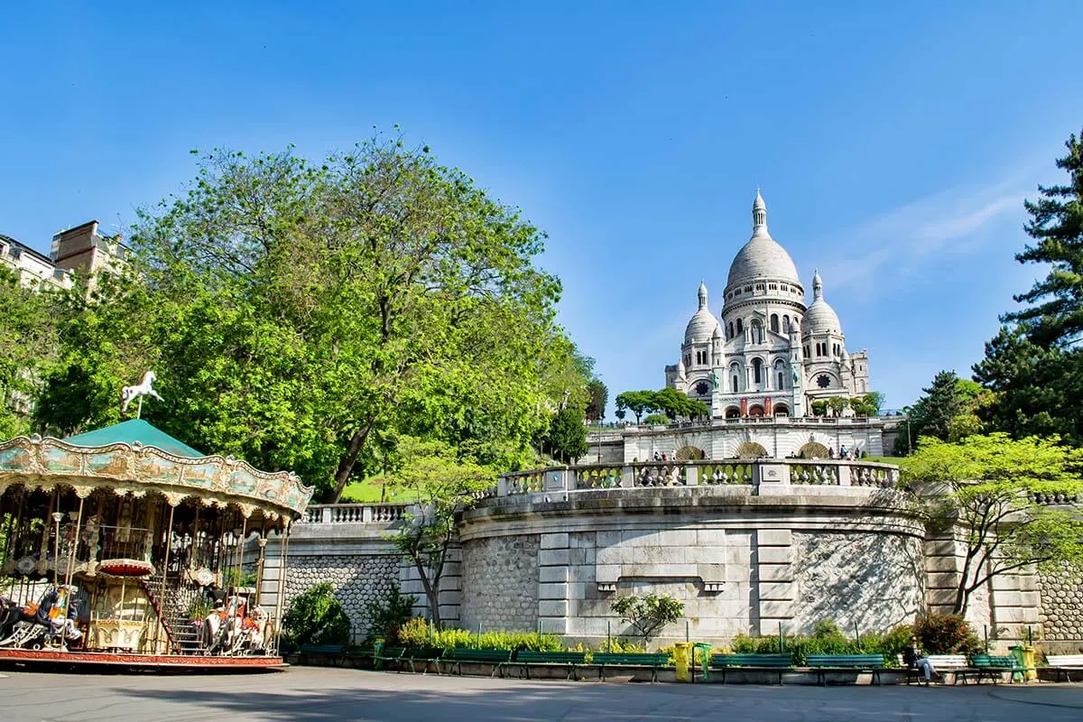 Square Louise Michel, Montmarte Carousel, and Sacre Coeur Basilica in Montmartre Paris