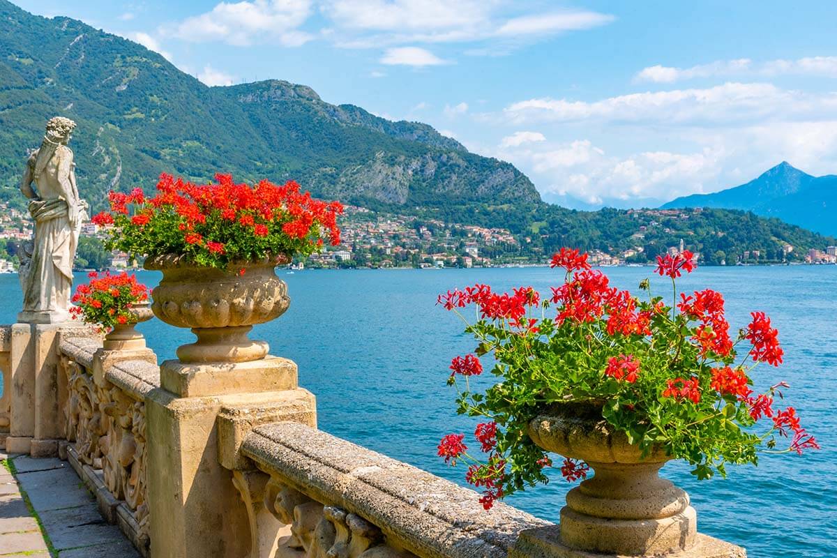 Villa Balbianello gardens, flowers, and sculptures with Lake Como view
