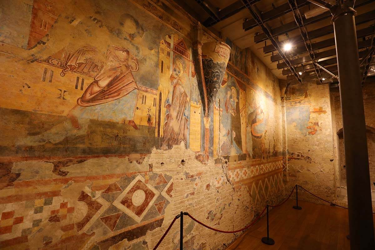 Ancient frescoes at the Crypt of Duomo di Siena in Italy