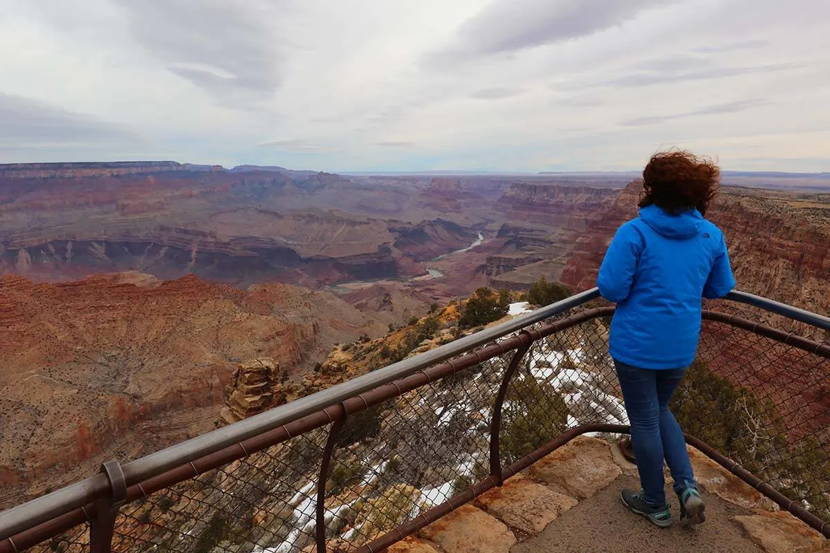 Traveler at the Grand Canyon Desert View lookout in winter
