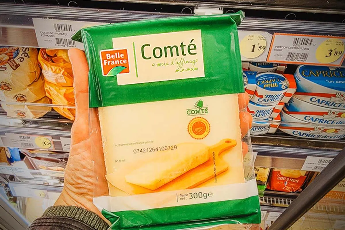 Comte French cheese at a supermarket in Paris France