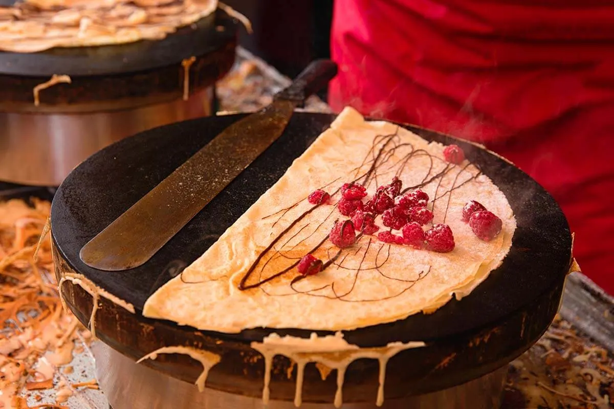 French crepes pancakes baked on a street cafe in Paris France