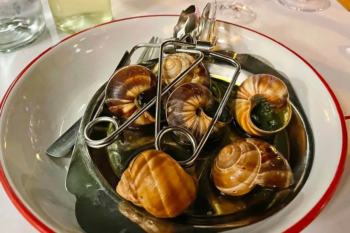 French escargots (snails) - traditional dish served at Bouillon Pigalle restaurant in Paris