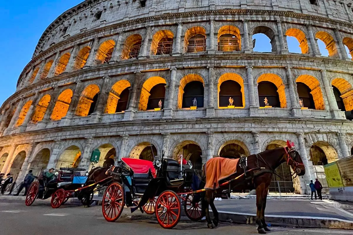 Horse-drawn carriage at the Colosseum in Rome Italy