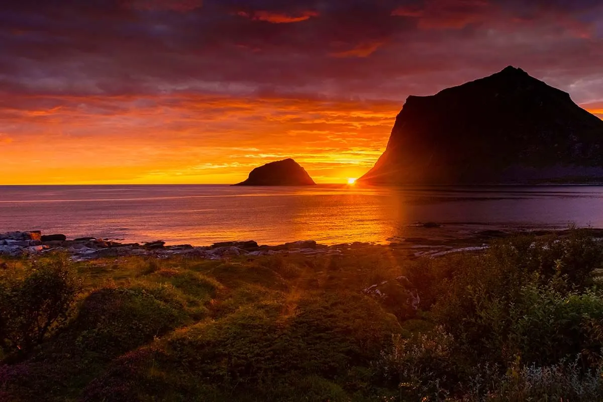 Lofoten midnight sun at Vik Beach on Vestvagoya island