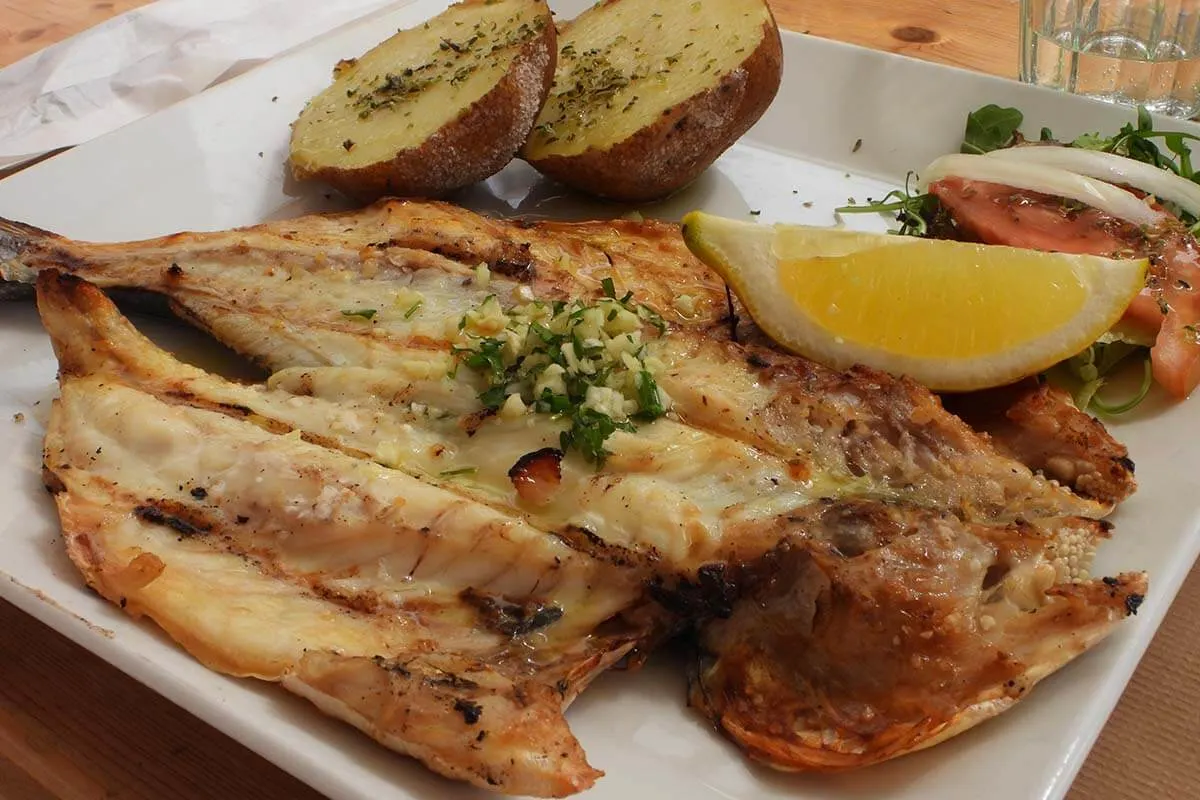 Portuguese fish dish at the O Stop restaurant at Vale de Centeanes Beach in Algarve