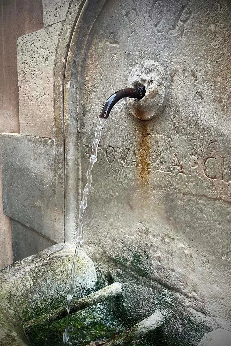 Drinking water fountain in Rome Italy